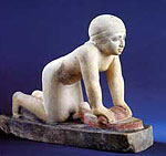 Servant girl grinding corn, Egypt, around 2450 B.C. (replica) 